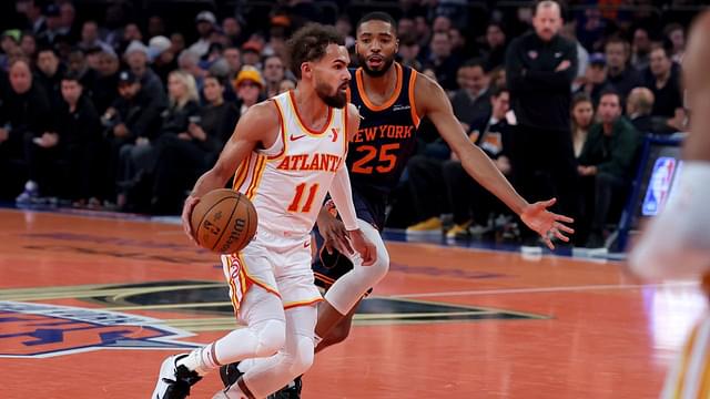 Atlanta Hawks guard Trae Young (11) controls the ball against New York Knicks forward Mikal Bridges (25) during the first quarter at Madison Square Garden.