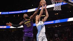 Los Angeles Lakers forward LeBron James (23) blocks the shot of Atlanta Hawks guard Dyson Daniels (5) in overtime at State Farm Arena.