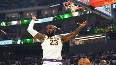 Los Angeles Lakers forward LeBron James (23) gestures after dunking against the Golden State Warriors during the first quarter at Chase Center.