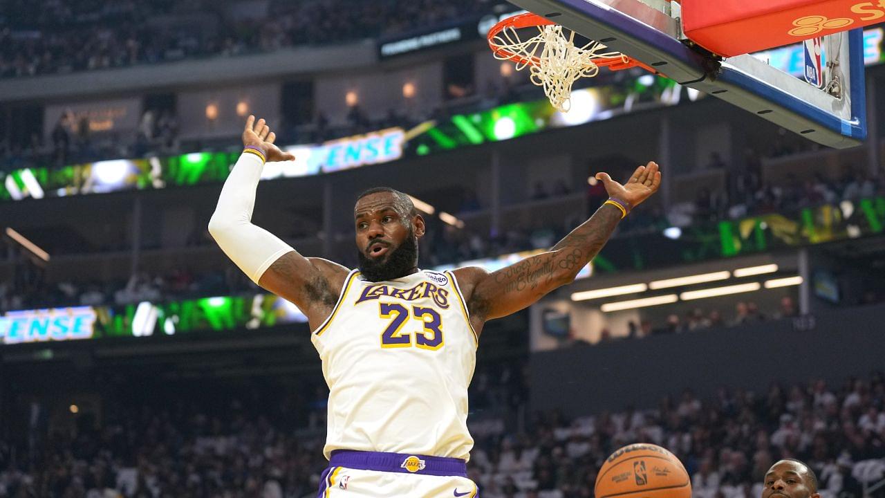 Los Angeles Lakers forward LeBron James (23) gestures after dunking against the Golden State Warriors during the first quarter at Chase Center.