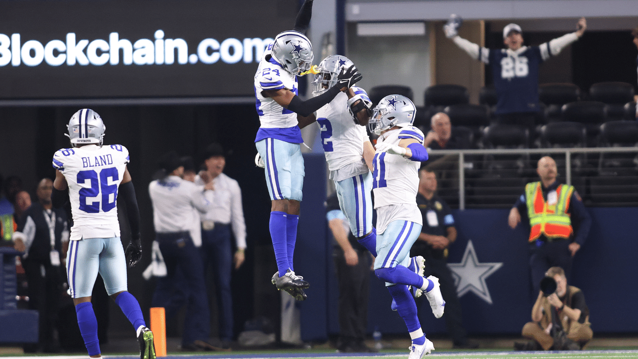 Dec 22, 2024; Arlington, Texas, USA; Dallas Cowboys cornerback Jourdan Lewis (2) celebrates after making an interception in the fourth quarter against the Tampa Bay Buccaneers at AT&T Stadium. Mandatory Credit: Tim Heitman-Imagn Images