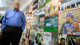 Rick Hendrick pauses to look at the wall of photos that line the trailer from his late son, Ricky Hendrick's race team on display inside the 58,000-square foot Heritage Center in Concord, North Carolina.