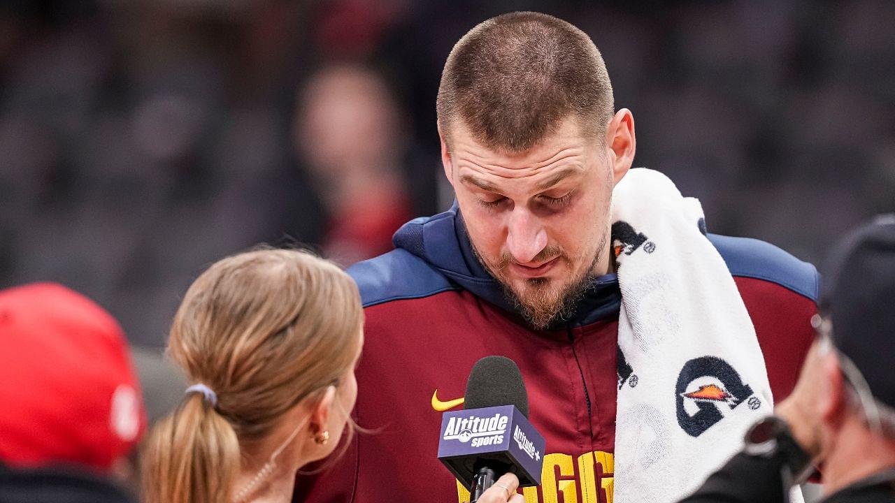 Denver Nuggets center Nikola Jokic (15) reacts while being interviewed after the game against the Atlanta Hawks during the second half at State Farm Arena.