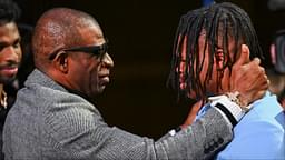 Colorado Buffaloes wide receiver/cornerback Travis Hunter with head coach Deion Sanders after winning the 2024 Heisman Trophy.