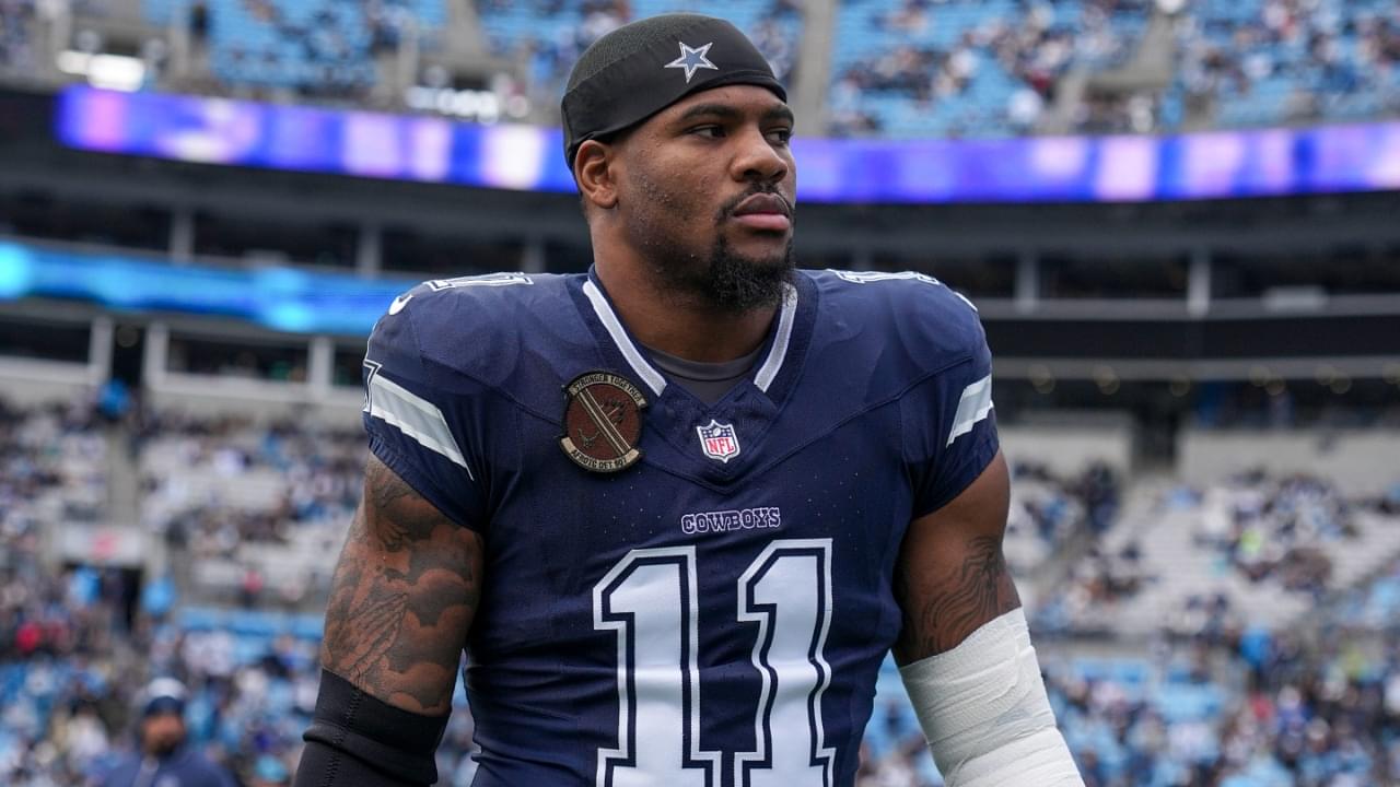 Dec 15, 2024; Charlotte, North Carolina, USA; Dallas Cowboys linebacker Micah Parsons (11) walks onto the field during the first quarter against the Carolina Panthers at Bank of America Stadium.