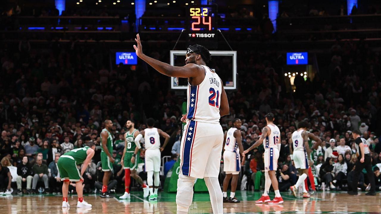 Philadelphia 76ers center Joel Embiid (21) interacts with fans during the second half against the Boston Celtics at TD Garden.