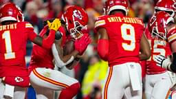 Dec 8, 2024; Kansas City, Missouri, USA; Kansas City Chiefs wide receiver DeAndre Hopkins (8) celebrates with teammate after scoring a touchdown during the first half against the Los Angeles Chargers at GEHA Field at Arrowhead Stadium.