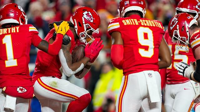 Dec 8, 2024; Kansas City, Missouri, USA; Kansas City Chiefs wide receiver DeAndre Hopkins (8) celebrates with teammate after scoring a touchdown during the first half against the Los Angeles Chargers at GEHA Field at Arrowhead Stadium.