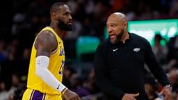 Los Angeles Lakers forward LeBron James (23) talks with Lakers head coach Darvin Ham (R) against the Washington Wizards at Capital One Arena.