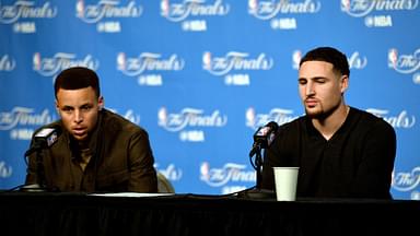 Golden State Warriors guard Stephen Curry (30) and guard Klay Thompson (11) during a press conference after game three of the NBA Finals against the Cleveland Cavaliers at Quicken Loans Arena.