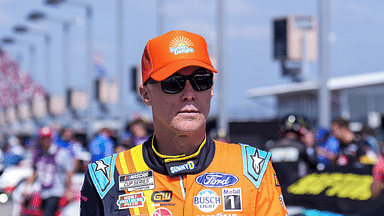 Kevin Harvick walks to his car for Cup practice at Darlington Raceway.