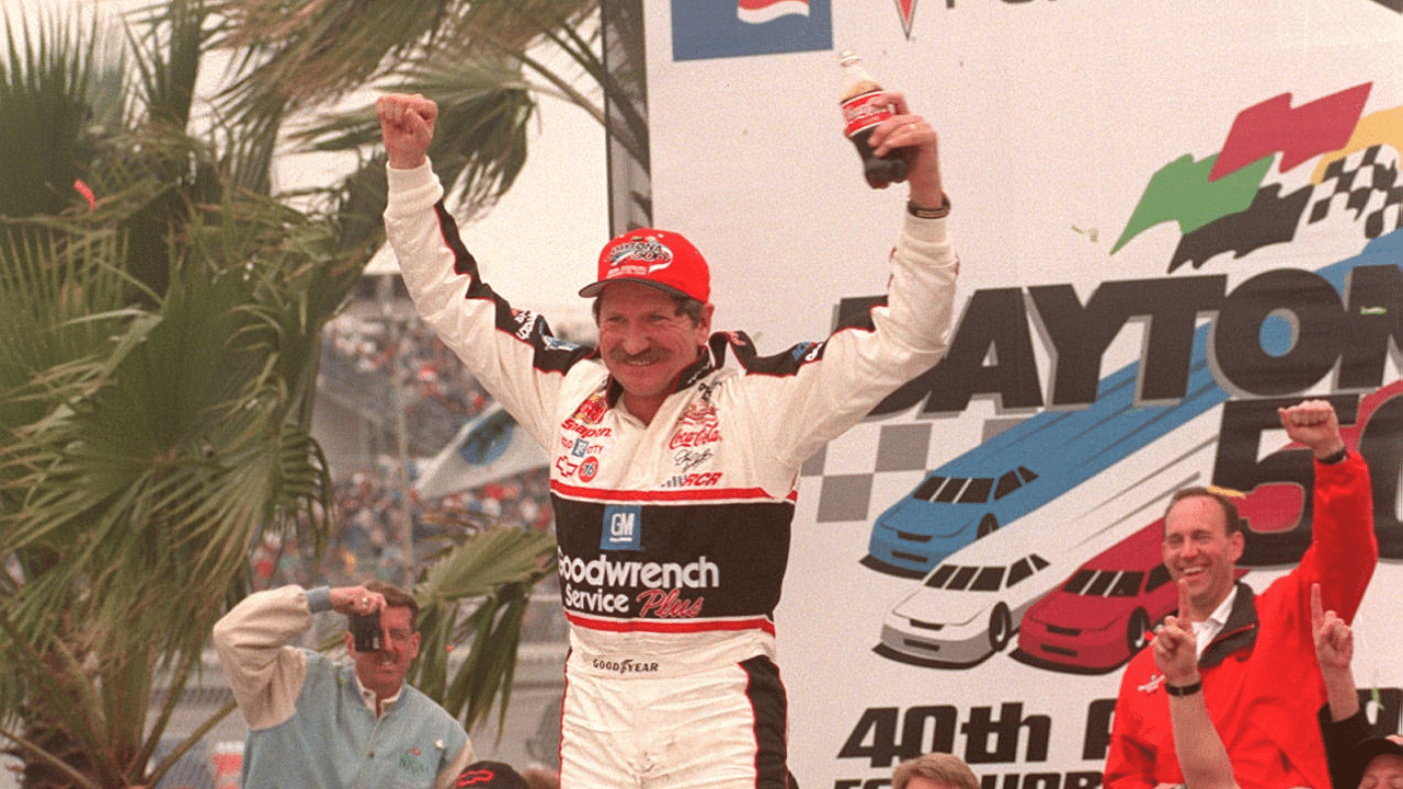 Dale Earnhardt celebrates winning the 1998 Daytona 500 in Victory Lane at Daytona International Speedway