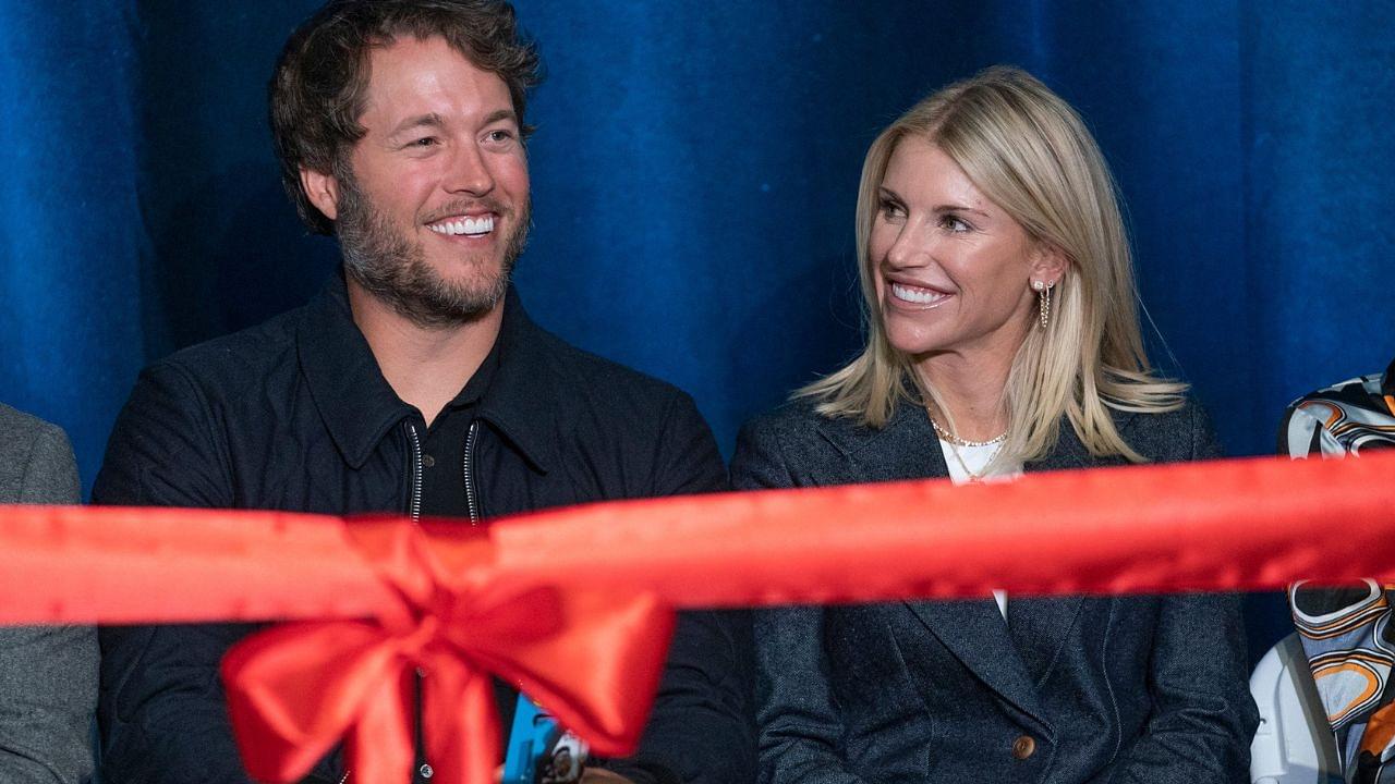 Mathew and Kelly Stafford share a laugh during speeches for the ribbon cutting of the Kelly and Matthew Stafford and Friends Education Center at the S.A.Y Detroit Play Center