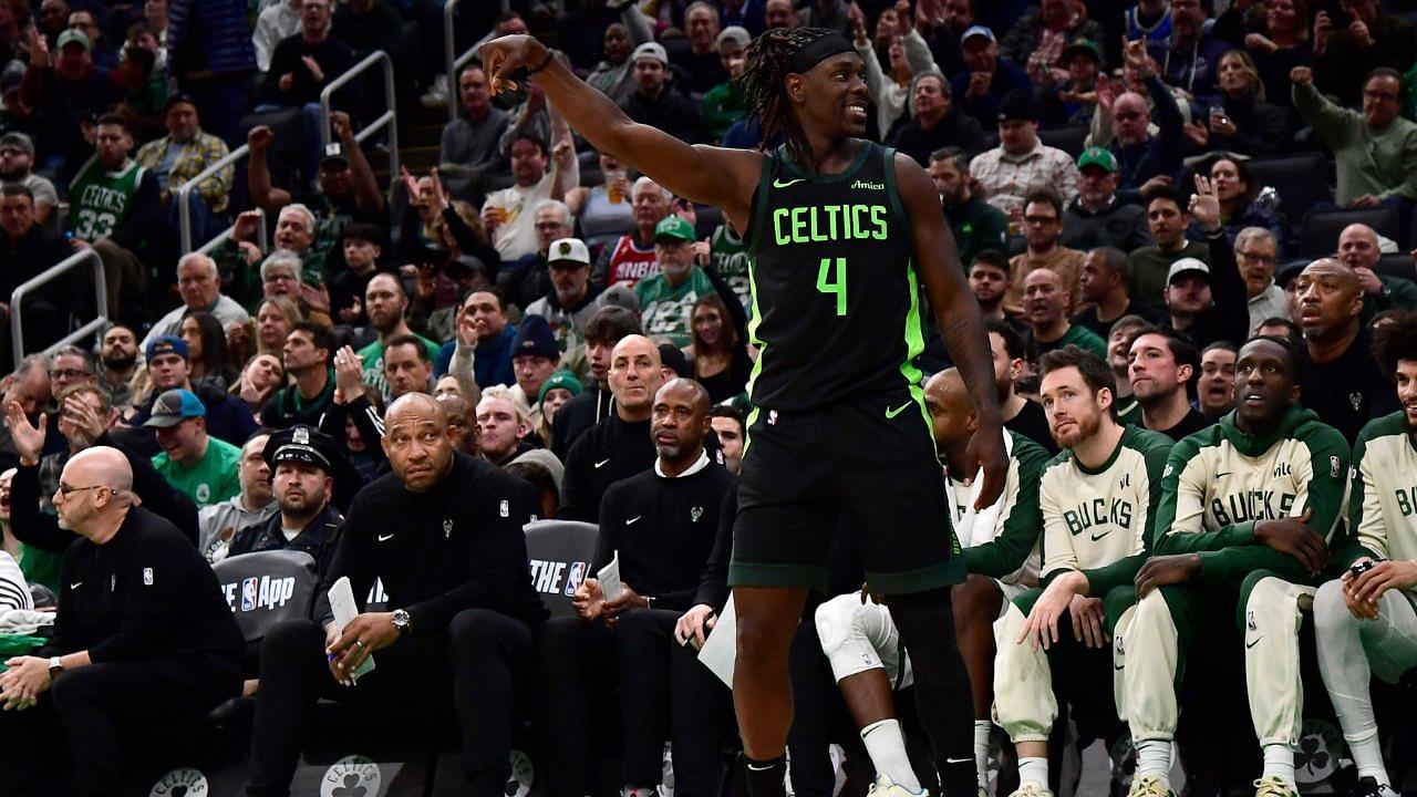 Boston Celtics guard Jrue Holiday (4) reacts after a three point basket during the second half against the Milwaukee Bucks at TD Garden.