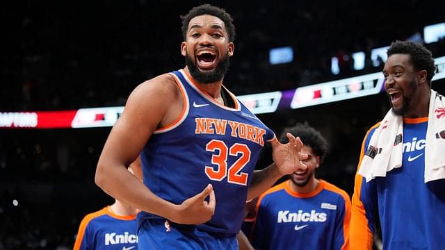 New York Knicks center Karl-Anthony Towns (32) reacts after a three point basket to clinch a win over the Toronto Raptors during the second half at Scotiabank Arena.