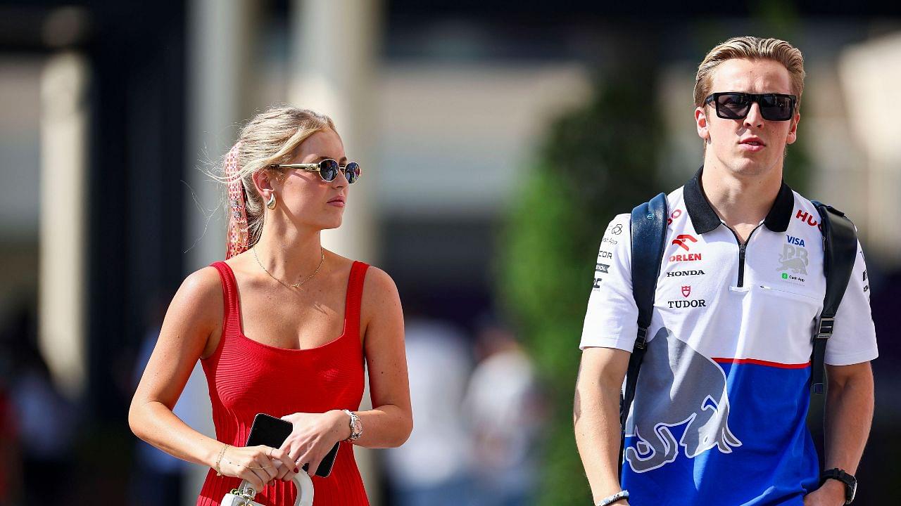 Liam Lawson of New Zealand and Visa Cash App RB with Girlfriend Hannah St John gesturing, Gesturing, Qualifying, F1 Grand Prix of Abu Dhabi, Yas Marina Circuit