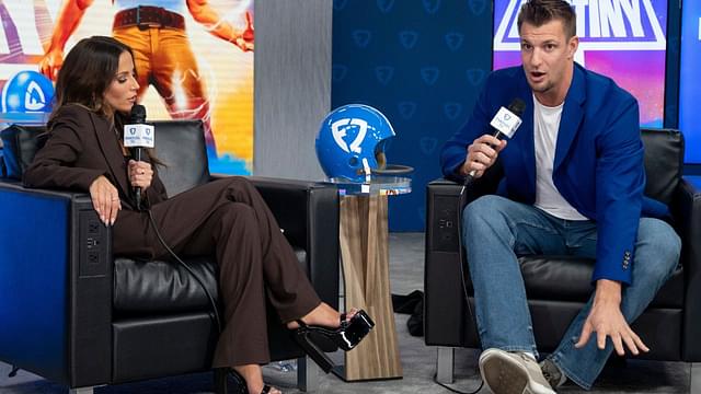 Fan Duel TV host Kay Adams interviews Former NFL tight end Rob Gronkowski about the Kick of Destiny during a press conference at the Phoenix Convention Center.