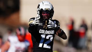 Nov 29, 2024; Boulder, Colorado, USA; Colorado Buffaloes wide receiver Travis Hunter (12) celebrates his first down reception in the fourth quarter against the Oklahoma State Cowboys at Folsom Field.