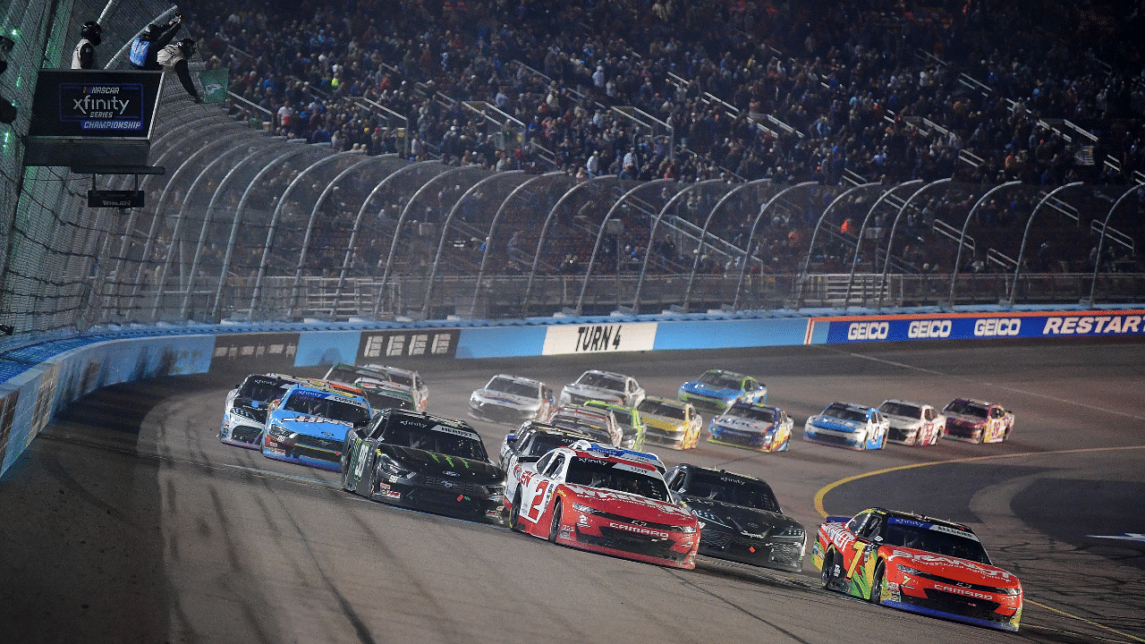 NASCAR Xfinity Series driver Jesse Love (2) and driver Justin Allgaier (7) lead the field for the restart during the NASCAR Xfinity Series championship race at Phoenix Raceway.