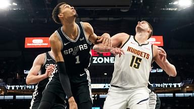 Denver Nuggets center Nikola Jokic (15) and San Antonio Spurs forward Victor Wembanyama (1) box out for a rebound during the second half at Frost Bank Center.