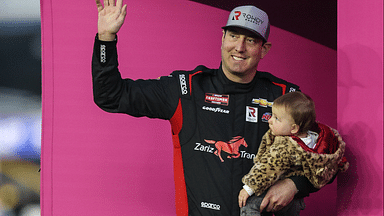 LAS VEGAS, NV - MARCH 03: Kyle Busch ( 51 Zariz Transport Chevrolet) and daughter on stage prior to the start of the NASCAR, Motorsport, USA Craftsman Truck Series Victoria s Voice Foundation 200, on March 3, 2023, at Las Vegas Motor Speedway in Las Vegas, NV.(Photo by Christopher Trim Icon Sportswire) AUTO: MAR 03 NASCAR Craftsman Truck Series Victoria s Voice Foundation 200 Icon23030306200