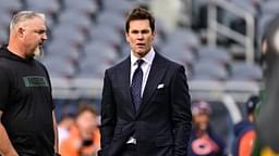 Former quarterback and current NFL announcer Tom Brady looks on before the game between the Chicago Bears and Green Bay Packers at Soldier Field.