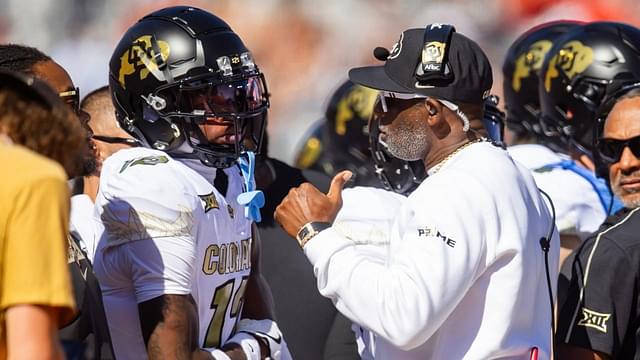 Colorado Buffalos wide receiver Travis Hunter (12) with head coach Deion Sanders against the Arizona Wildcats at Arizona Stadium.