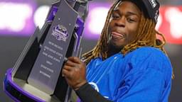 Boise State Broncos running back Ashton Jeanty (2) hoists the Mountain West Trophy after the game against the UNLV Rebels at Albertsons Stadium. Boise State beats UNLV 21-7.