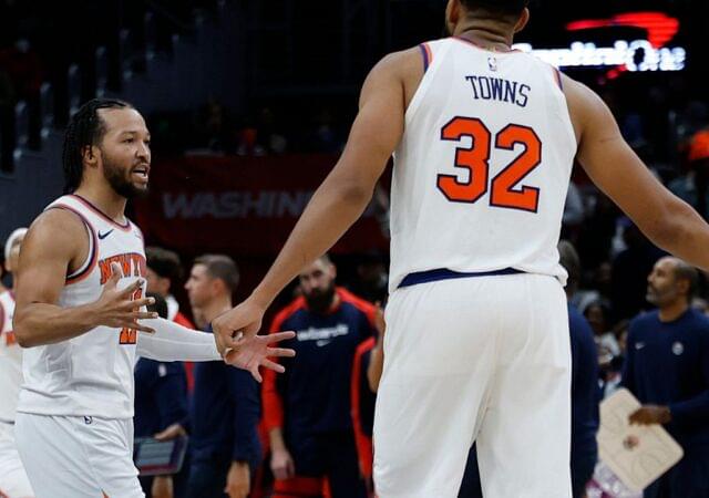 New York Knicks guard Jalen Brunson (11) celebrates with Knicks center Karl-Anthony Towns (32) against the Washington Wizards in the fourth quarter at Capital One Arena.