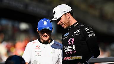 French driver Pierre Gasly ( Alpine F1 Team) and japanese driver Yuki Tsunoda ( Visa Cash App RB Racing) are seen during the Drivers Parade before the FIA Formula 1 Abu Dhabi Grand Prix