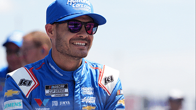 Aug 31, 2024; Darlington, South Carolina, USA; NASCAR Cup Series driver Kyle Larson (5) sits by his car prior to practice during practice for the Cook Out Southern 500 at Darlington Raceway. Mandatory Credit: Jasen Vinlove-Imagn Images