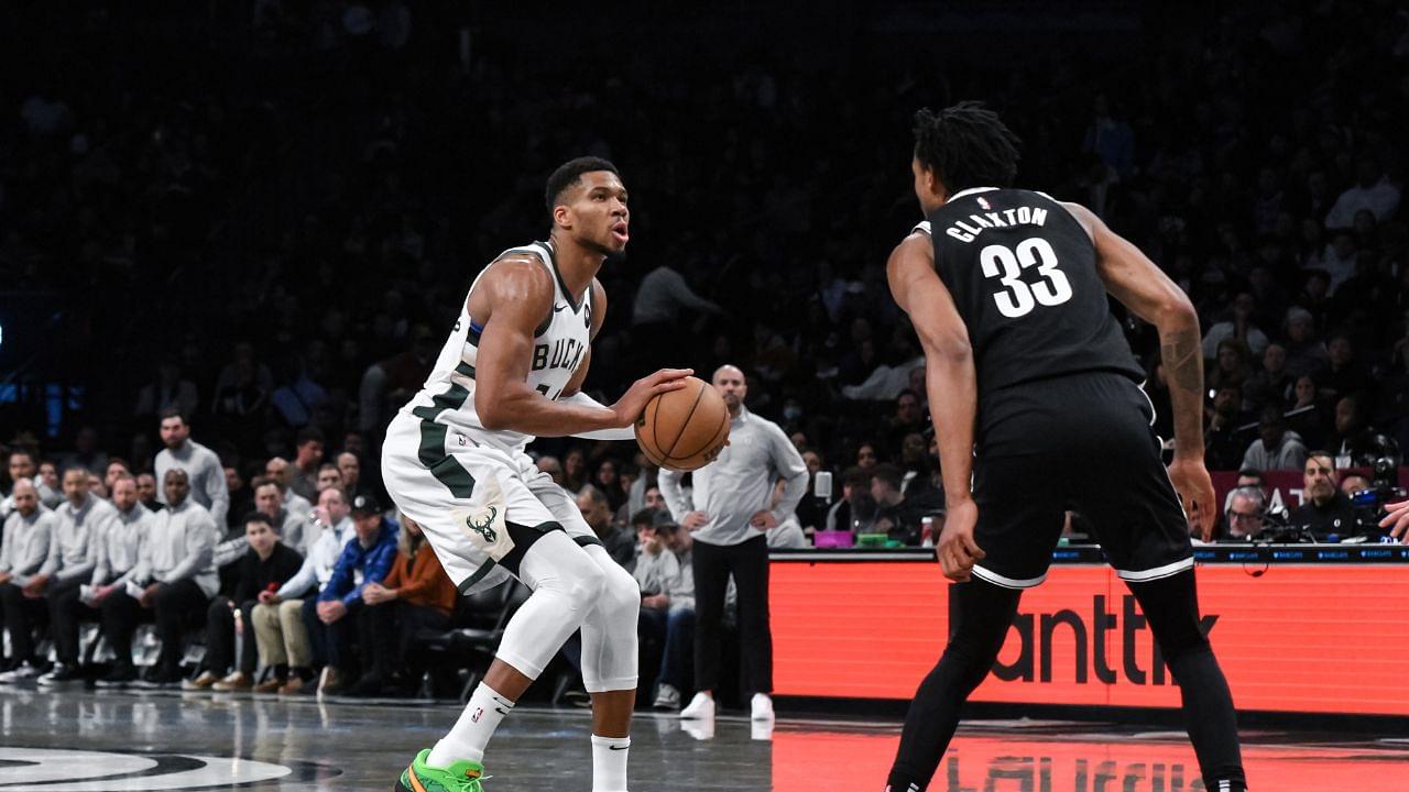 Milwaukee Bucks forward Giannis Antetokounmpo (34) looks to shoot the ball as Brooklyn Nets center Nic Claxton (33) defends during the second half at Barclays Center.