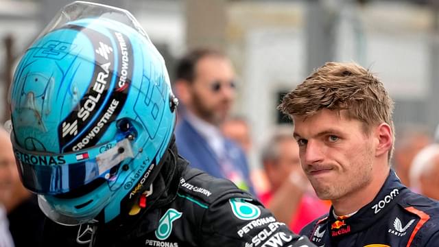 George Russell (Mercedes) and Max Verstappen (Red Bull Racing) after the Italian Grand Prix at the Monza circuit