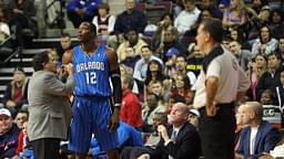 Orlando Magic center Dwight Howard (12) fouls out in the fourth quarter and talks with head coach Stan Van Gundy at The Palace of Auburn Hills. The Pistons defeated the Magic 85-80.