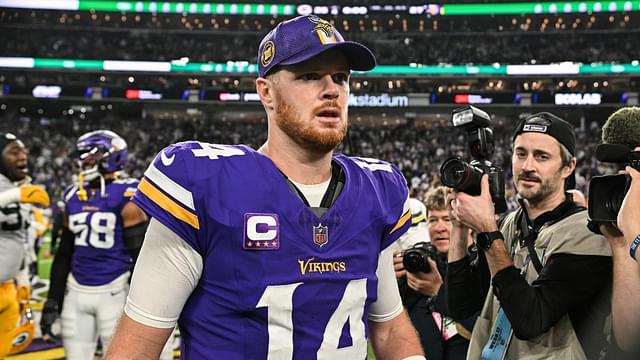 Minnesota Vikings quarterback Sam Darnold (14) walks off the field after the game against the Green Bay Packers at U.S. Bank Stadium.