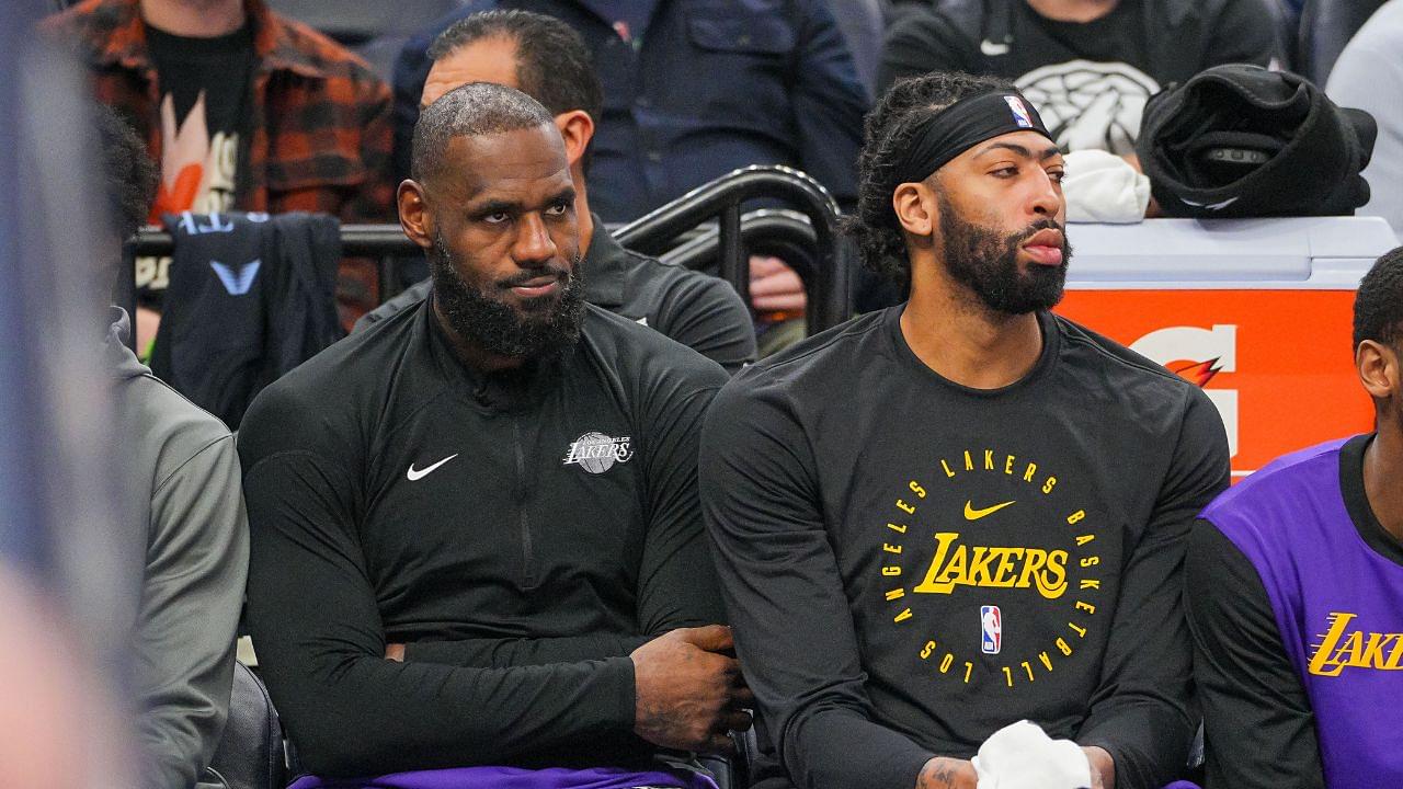 Los Angeles Lakers forward LeBron James (23) and forward Anthony Davis (3) on the bench against the Minnesota Timberwolves in the fourth quarter at Target Center.