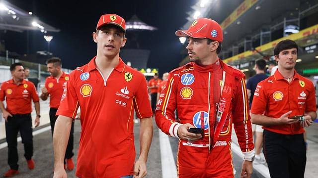 Charles Leclerc and Arthur Leclerc of Ferrari are seen ahead of Formula 1 Abu Dhabi Grand Prix at Yas Marina Circuit