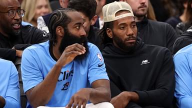 Los Angeles Clippers guard James Harden (1, left) and Kawhi Leonard (right) watch the game against the Utah Jazz from the bench during the fourth quarter at Intuit Dome.