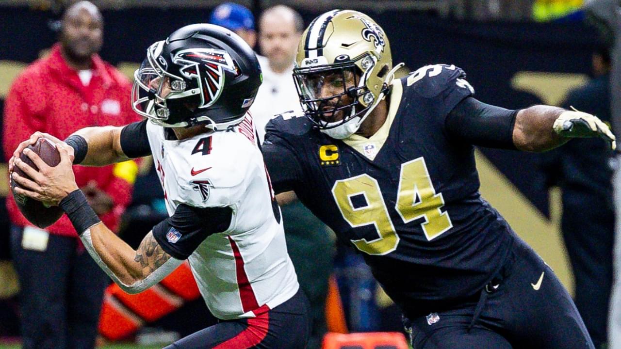 Dec 18, 2022; New Orleans, Louisiana, USA; New Orleans Saints defensive end Cameron Jordan (94) sacks Atlanta Falcons quarterback Desmond Ridder (4) but it called back for a fack mask penalty during the second half at Caesars Superdome.