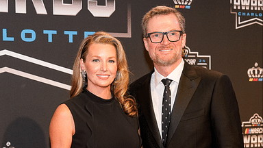 Nov 22, 2024; Charlotte, NC, USA; Dale Earnhardt Jr. and wife Amy during the NASCAR Awards Banquet at Charlotte Convention Center. Mandatory Credit: Jim Dedmon-Imagn Images