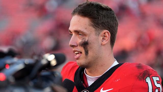 Georgia quarterback Carson Beck (15) speaks with the media after a NCAA college football game against Massachusetts in Athens, Ga., on Saturday, Nov. 23, 2024. Georgia won 59-21.