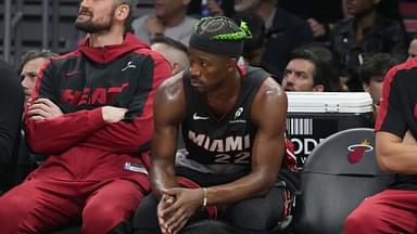 Miami Heat forward Jimmy Butler (22) looks on from the bench during the second half at Kaseya Center.