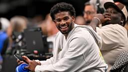 Colorado Buffaloes quarterback Shedeur Sanders laughs as he watches the game between the Dallas Mavericks and the Denver Nuggets during the second half at the American Airlines Center.