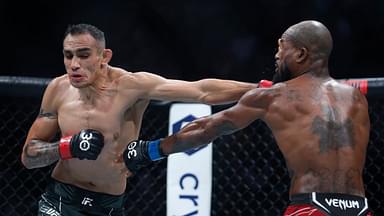 Tony Ferguson (red gloves) fights Bobby Green (blue gloves) during UFC 291 at Delta Center.