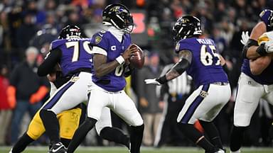 Baltimore Ravens quarterback Lamar Jackson (8) looks to pass in the second quarter against the Pittsburgh Steelers in an AFC wild card game at M&T Bank Stadium.