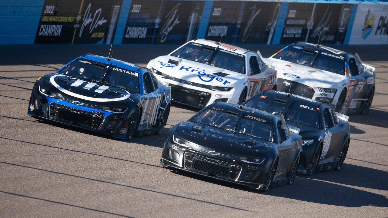 NASCAR Cup Series driver Erik Jones (43) races alongside Ross Chastain (1) during testing at Phoenix Raceway.