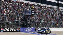 NASCAR Cup Series driver Chase Elliott (9) crosses the finish line to win the DuraMAX Drydene 400 at Dover Motor Speedway.