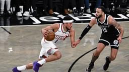 Phoenix Suns guard Devin Booker (1) drives to the basket while being defended by Brooklyn Nets guard Tyrese Martin (13) during the second half at Barclays Center