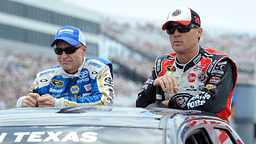 Sprint Cup Series driver Mark Martin (55) and driver Kevin Harvick (29) wait for the start of the FedEx 400 Benefiting Autism Speaks at Dover International Speedway.