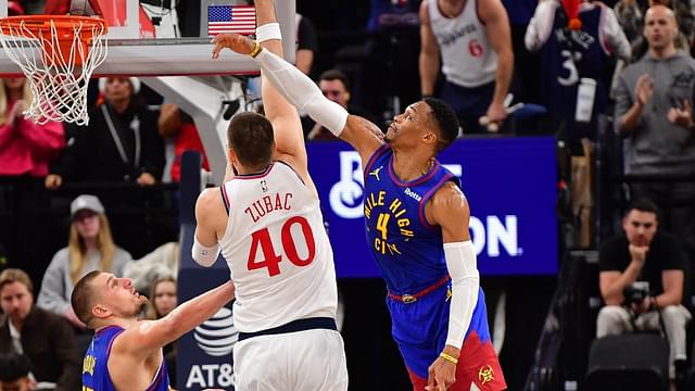 Los Angeles Clippers center Ivica Zubac (40) moves to the basket against Denver Nuggets center Nikola Jokic (15) and guard Russell Westbrook (4) during the second half at Intuit Dome